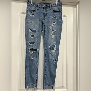 American Eagle Super Stretch Super Low Rise Raw Hem Jegging  Jeans.